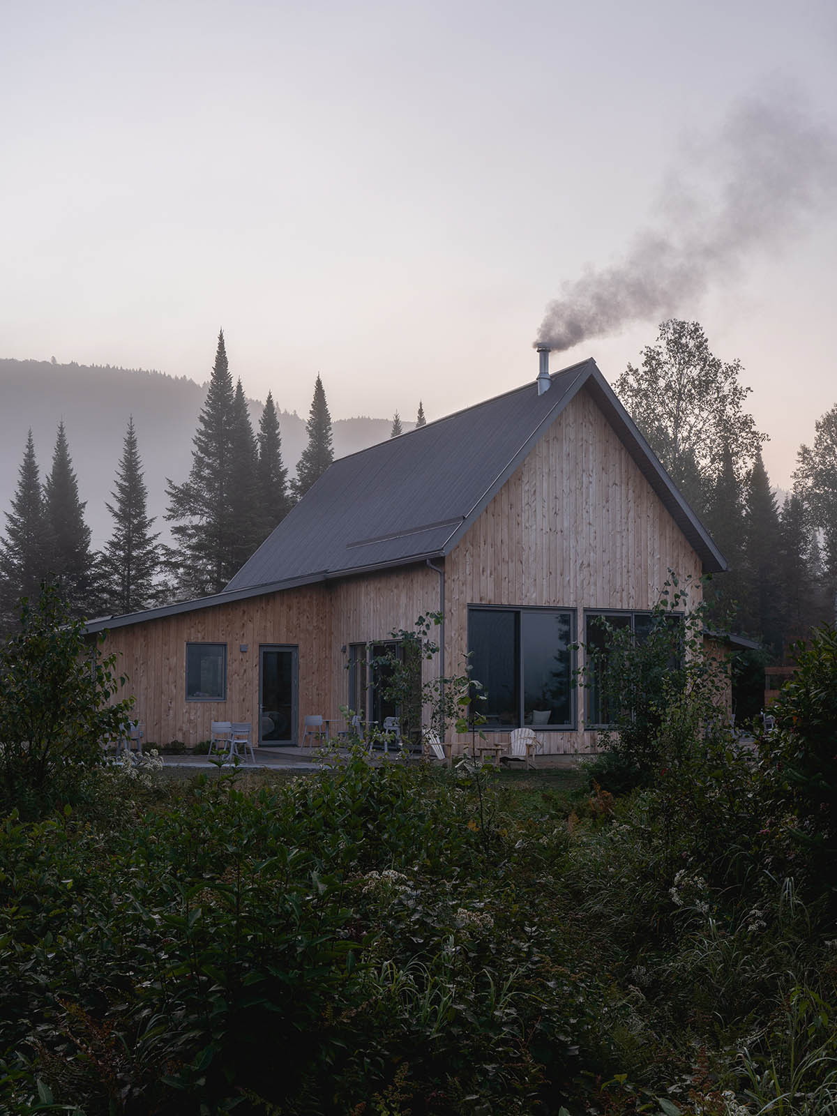 Four A-framed cabins by Atelier L'Abri captures the wild beauty of ...