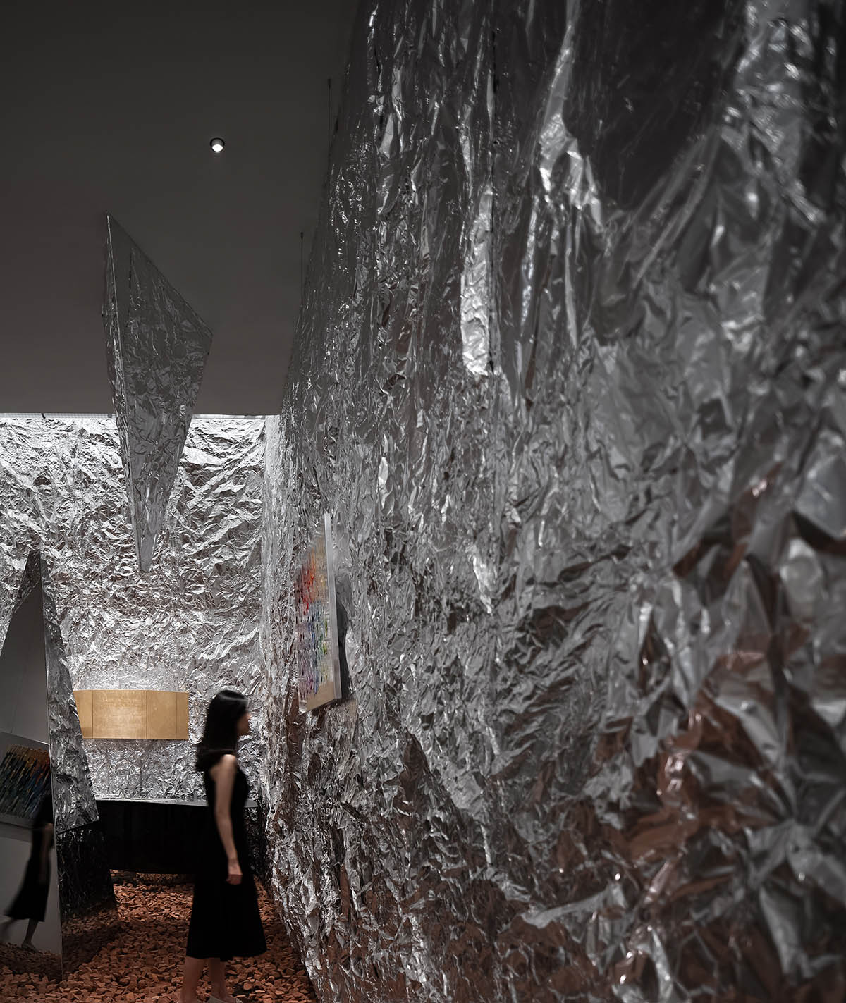 AD ARCHITECTURE creates metallic interiors for Mirror Gallery exhibition space in Shenzhen