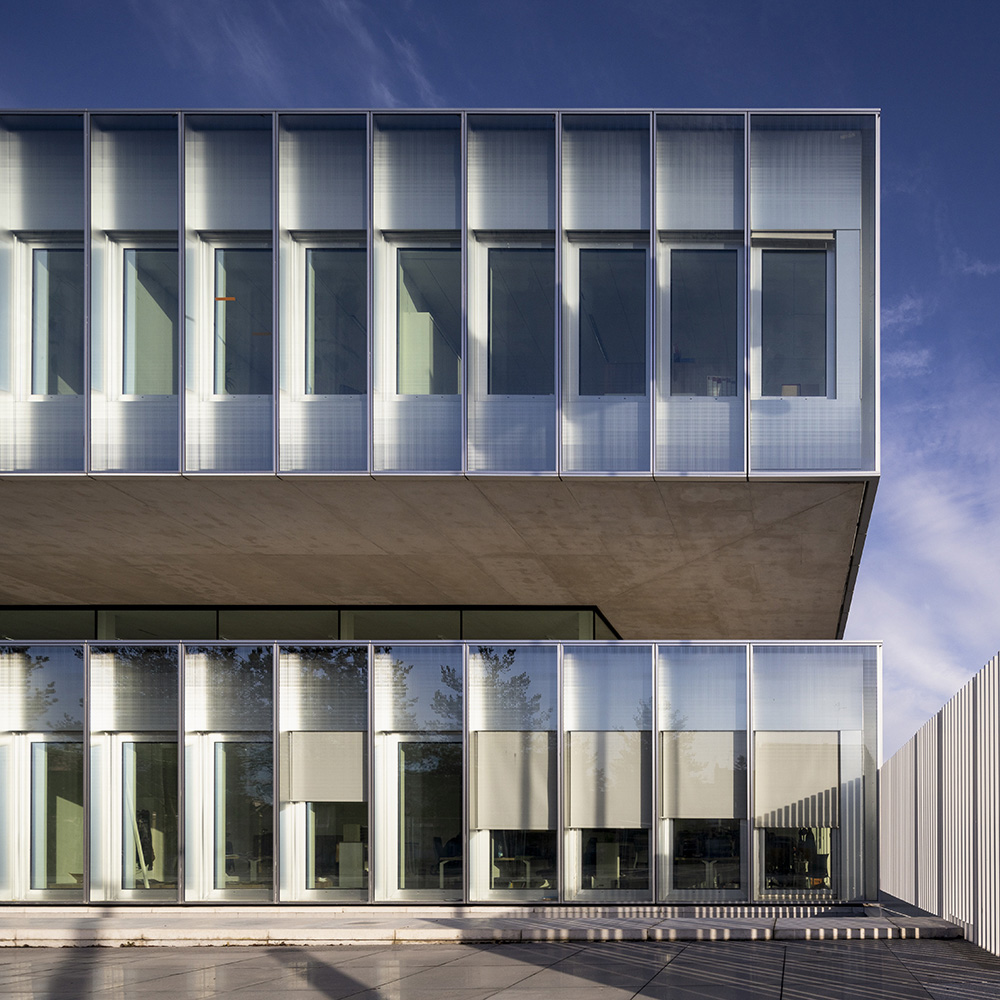KAAN Architecten and PDAA built monolithic glazed CMA headquarters in Lille