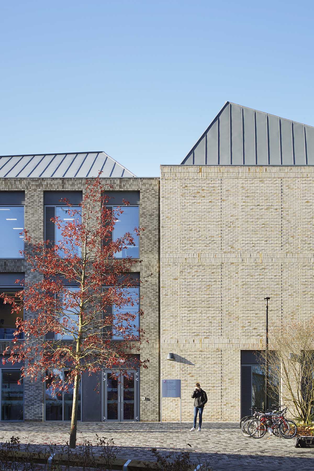 FaulknerBrowns Architects completes teaching and learning centre with pyramidal roofs in Durham