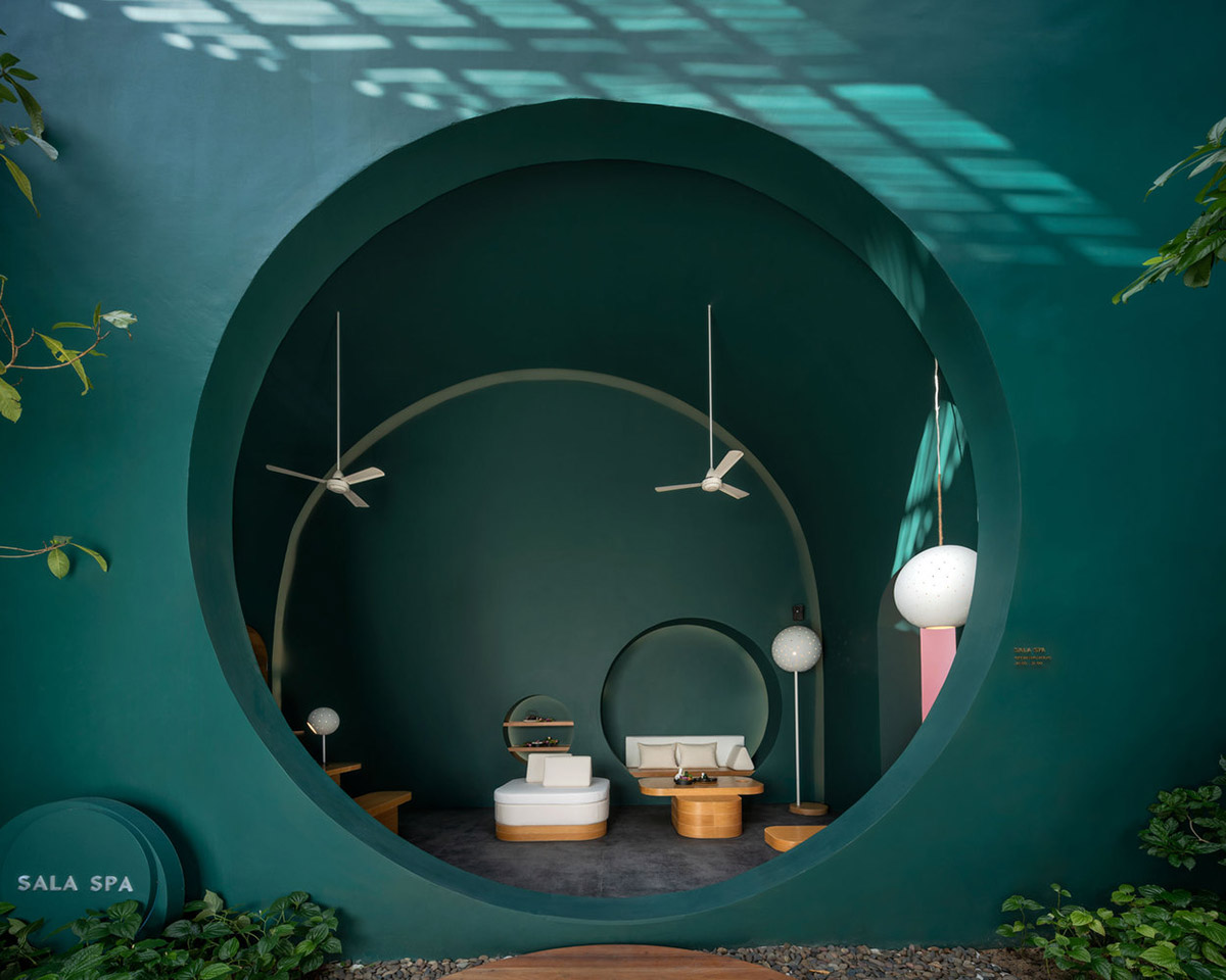 onion combines white concave and convex walls with colorful surfaces for beach resort in Thailand