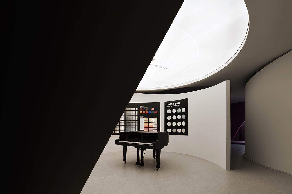 Exhibition hall interiors in China feature unconstrained flowing wall evoking