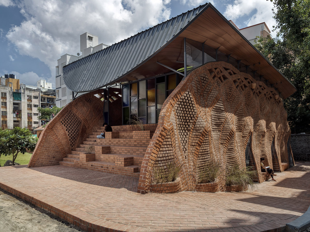 PMA madhushala's community center features undulating and artistic brick walls in Pune