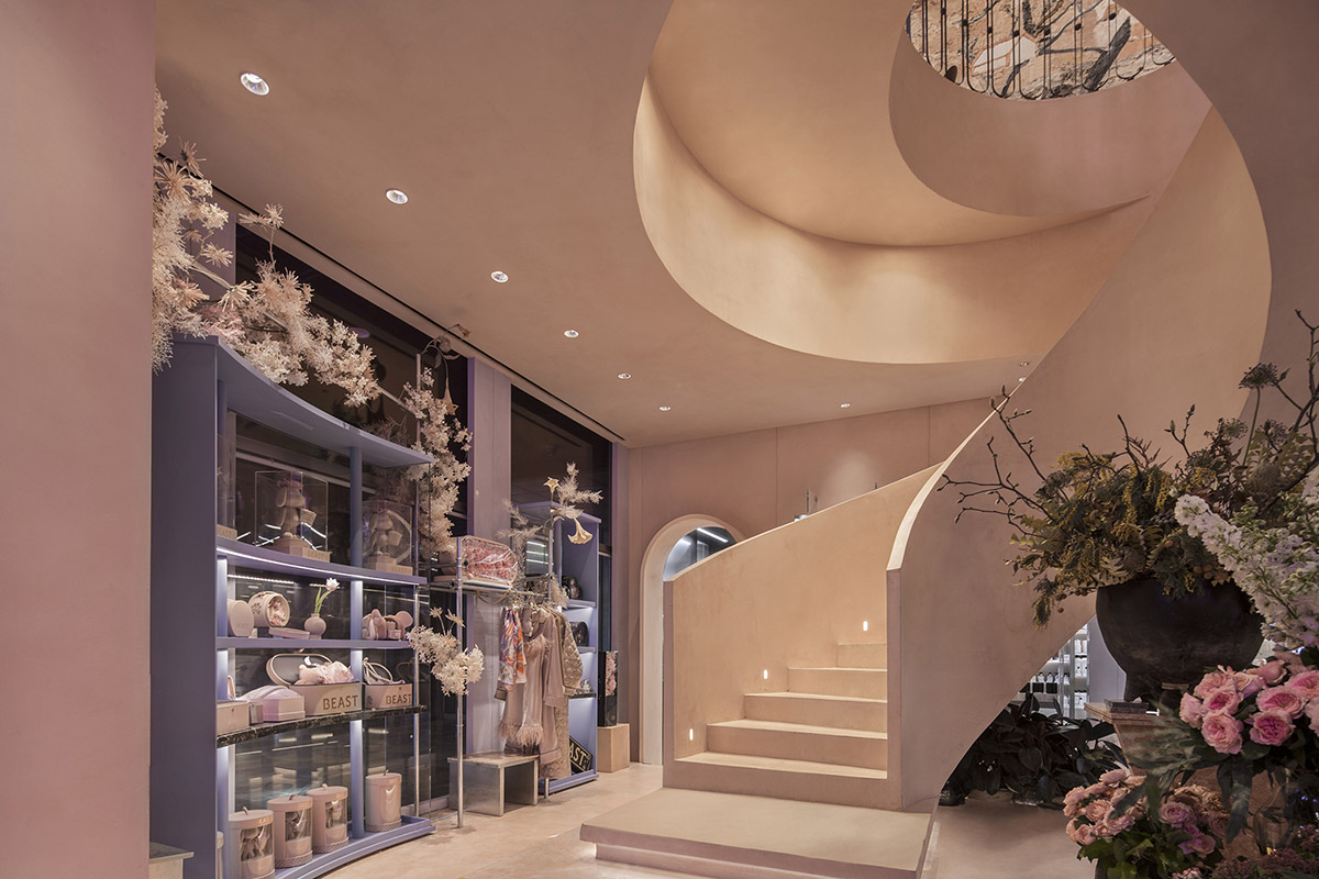 S&ograve; Studio combines metallic and pinkish-colored interior for Beijing store