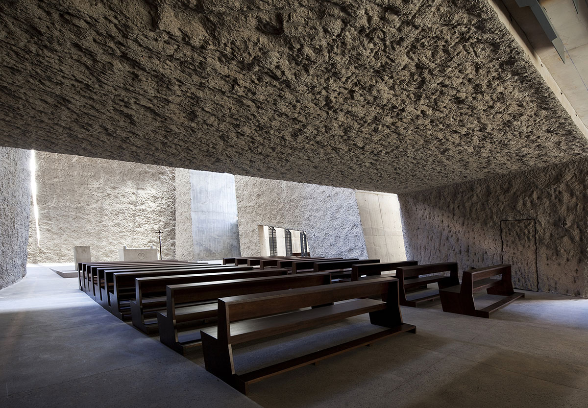 Menis Arquitectos designs church and community centre in Spain with four massive concrete volumes 
