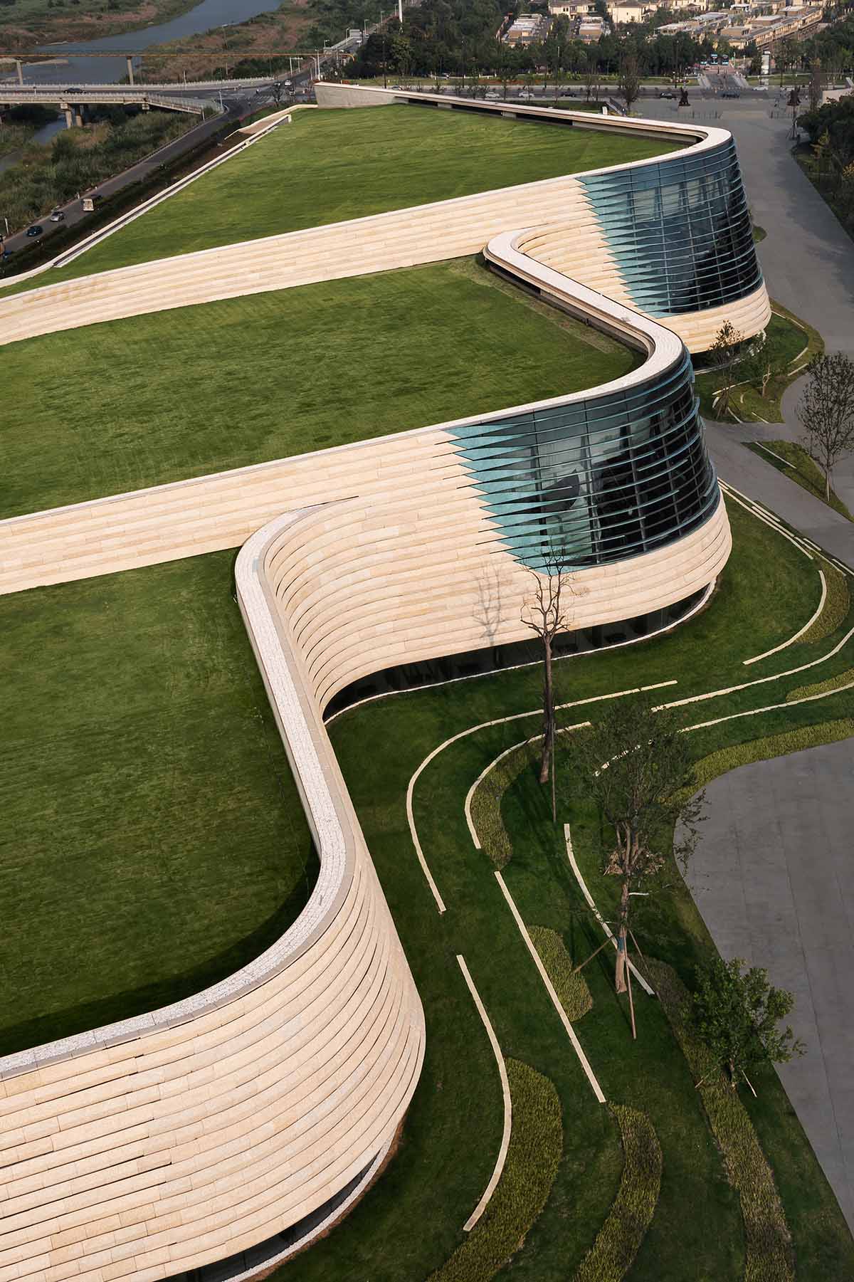 Mound-shaped museum by CSWADI rises from the earth like