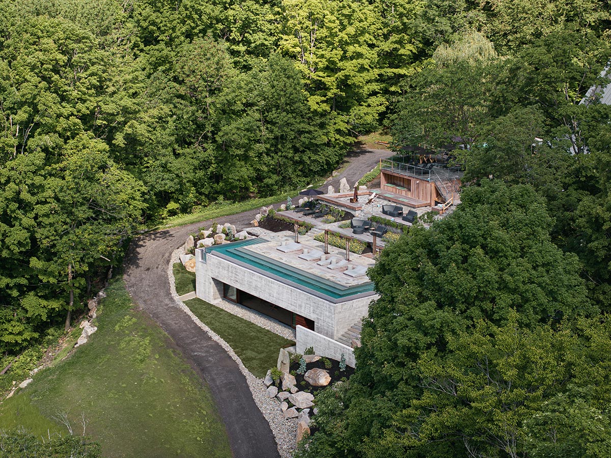 MacKay-Lyons Sweetapple Architects expands a concrete spa and thermal reserve in Quebec