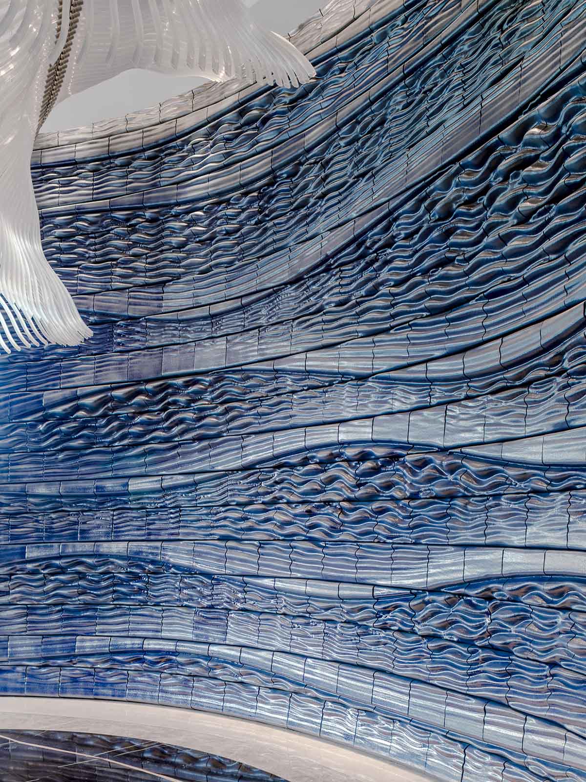 Studio RAP wraps the entrance of a hotel with majestic 3D printed ceramic walls 