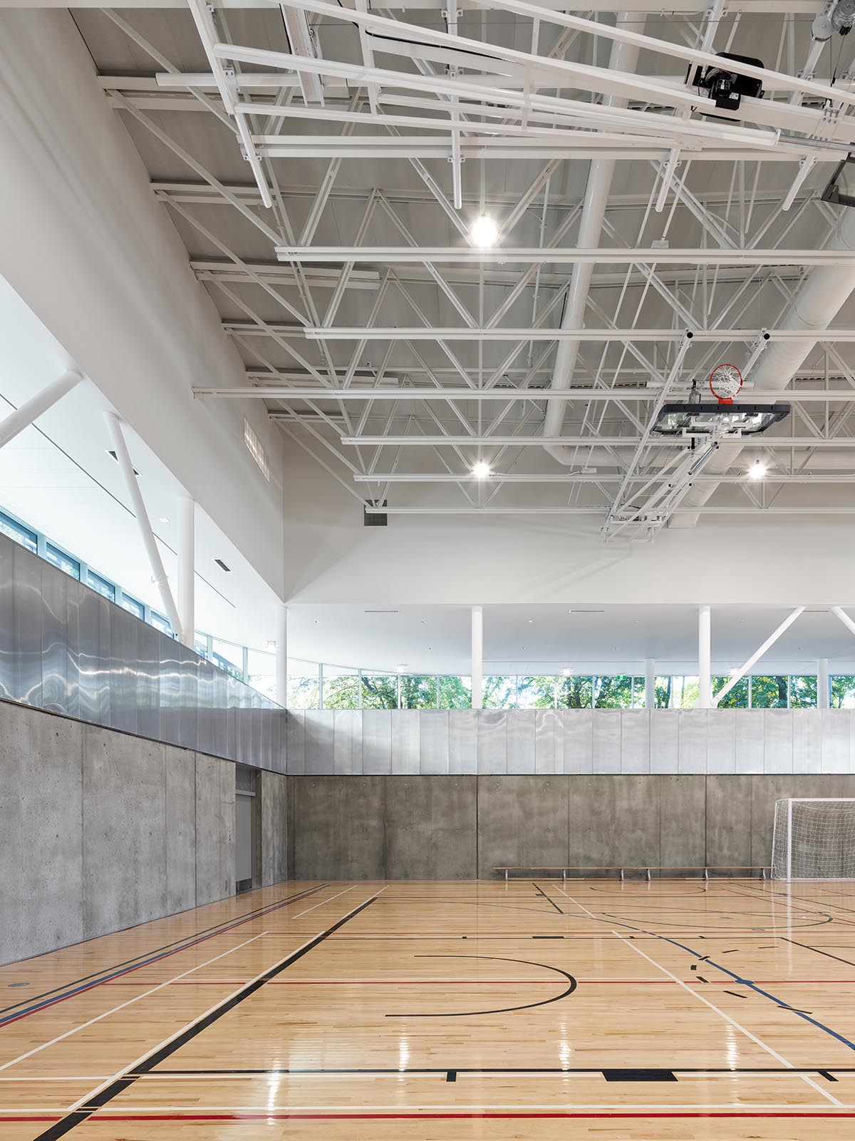 ACDF Architecture merges strict and fluid geometries for a sports complex in Montreal