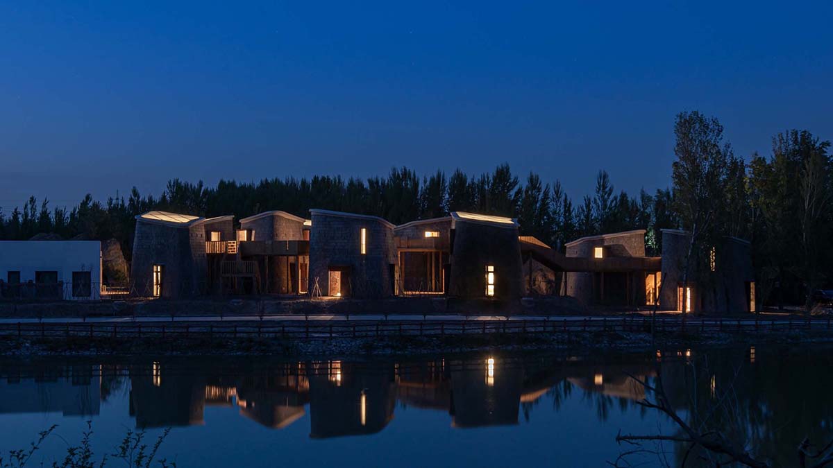 Hyperbolic vertical grottos are activated by a network of floating wooden bridges in China