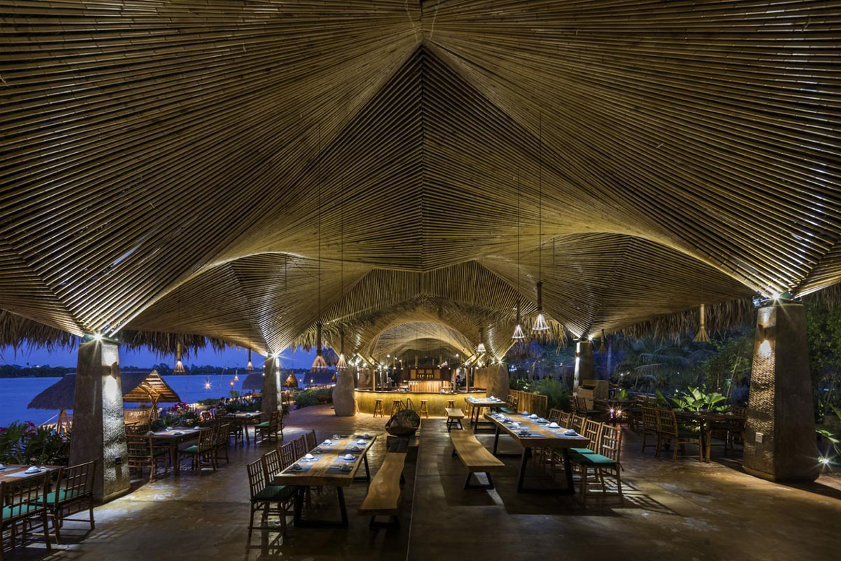 DDconcept Architecture uses coconut leaves and bamboo to create undulating restaurant in Vietnam