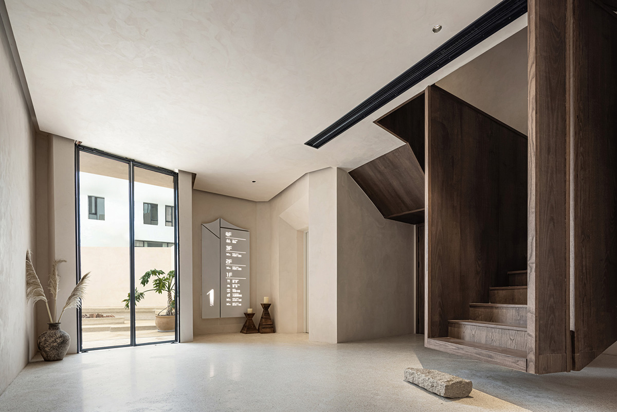 Oblique and hollow walls form this sculpted hotel by AT DESIGN in Southeast of Xiamen