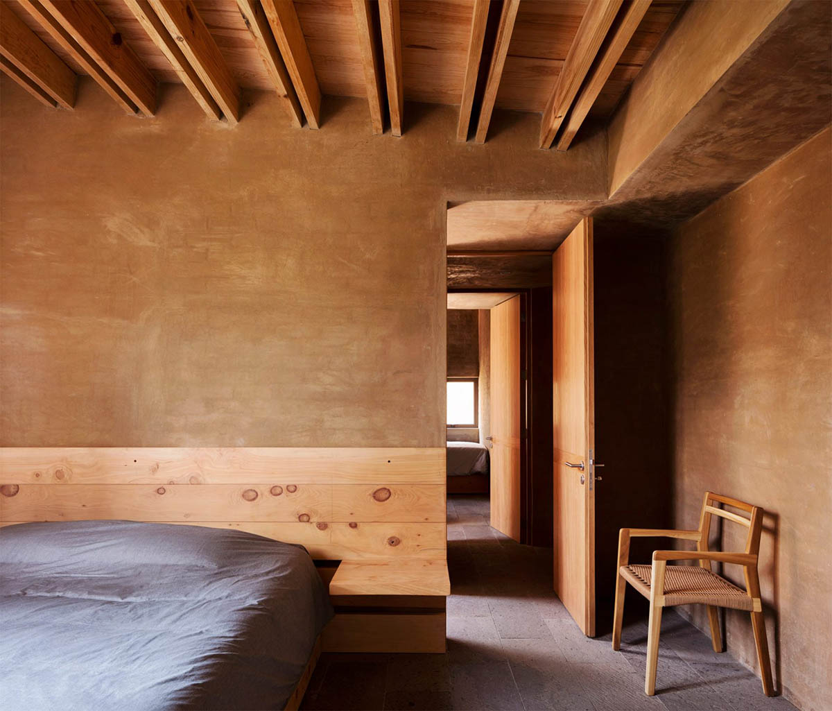 Taller Hector Barroso built five weekend houses from red-coloured terra-cotta in Mexican forest