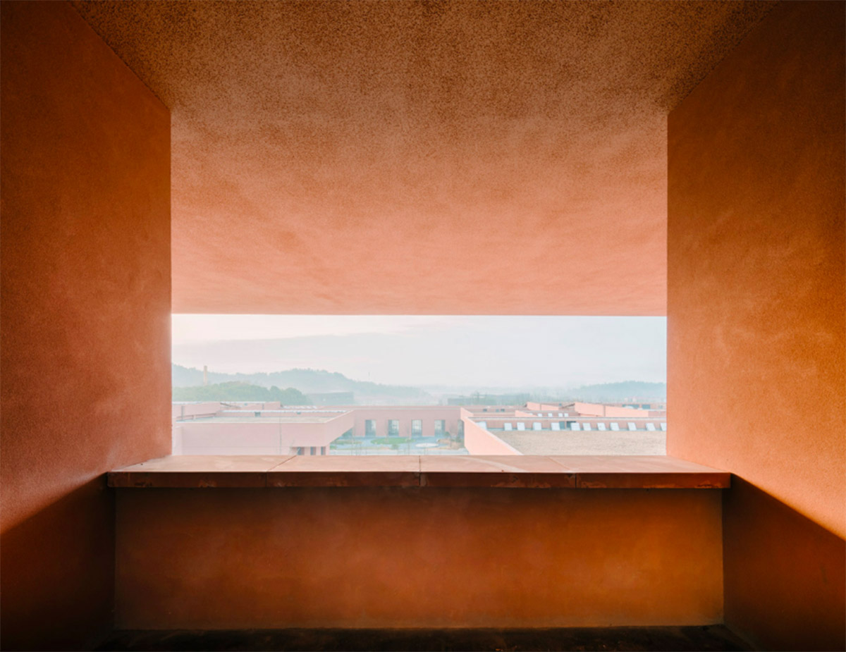 David Chipperfield completes Zhejiang Museum of Natural History with red ochre paint in Anji