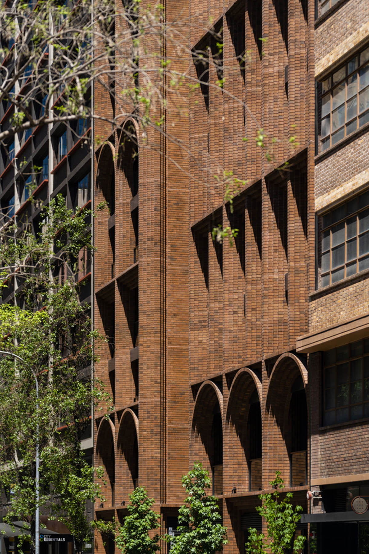 Koichi Takada Architects creates a sculpted form made of hand-brick material for new tower in Sydney
