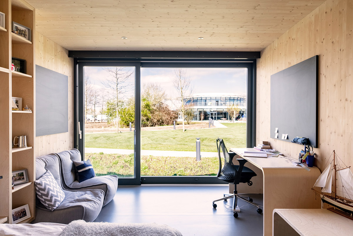 WilkinsonEyre completes new student village made of timber modular housing pods at Dyson Institute