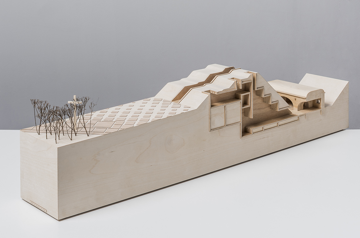 BBGK Architekci designed 12-metre-high stained concrete wall to narrate victims for Katyn Museum