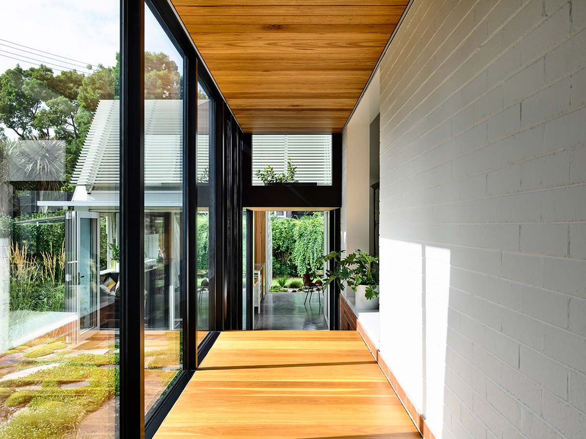 Austin Maynard Architects extends existing post-war Canberra house with two shingle-clad pavilions