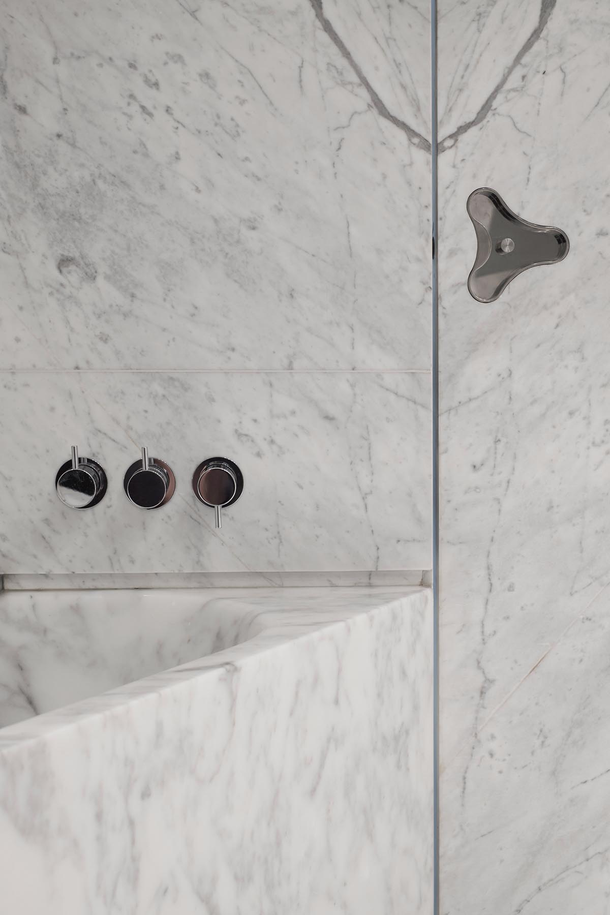 Elegant details and trefoil-shaped garden form this family house by Eldridge London in Coombe Park