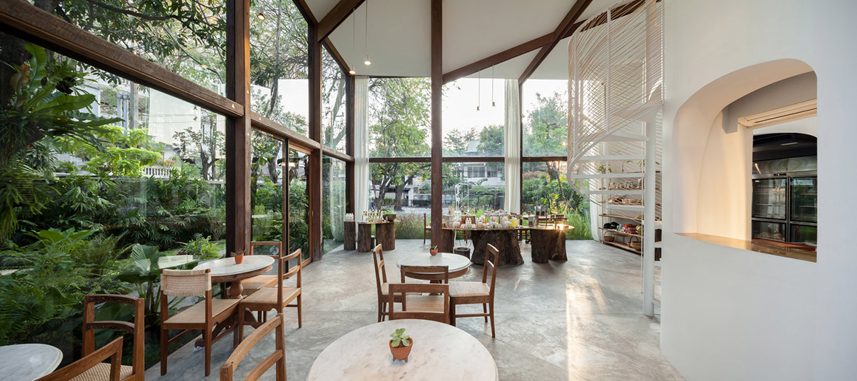 NitaProw designed an elegant transparent beauty shop within coconut trees of  Thonglor in Bangkok