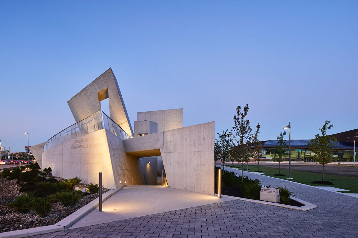 Daniel Libeskind’s Holocaust Monument features fragmented concrete walls creating rough landscape