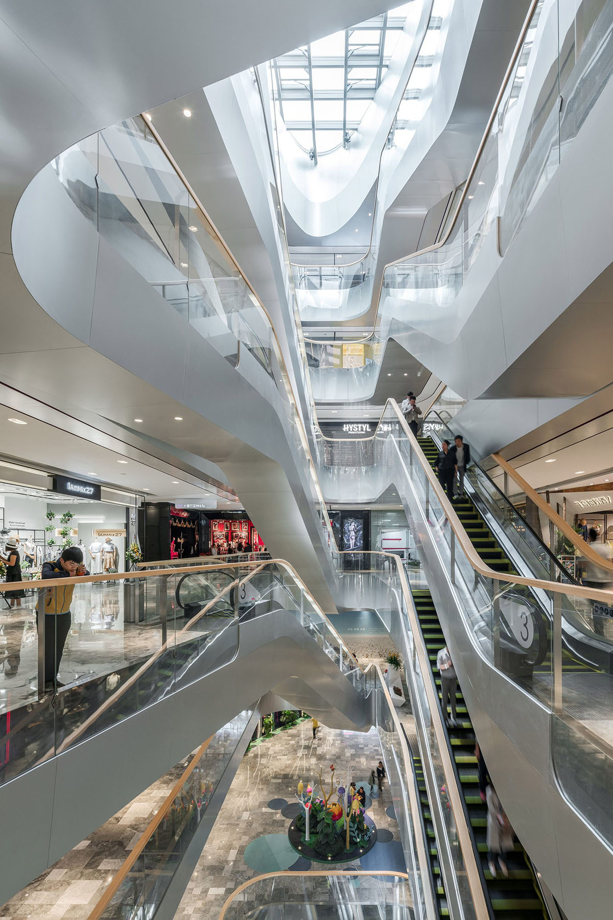 UNStudio completed Raffles City complex with twisted towers in Hangzhou