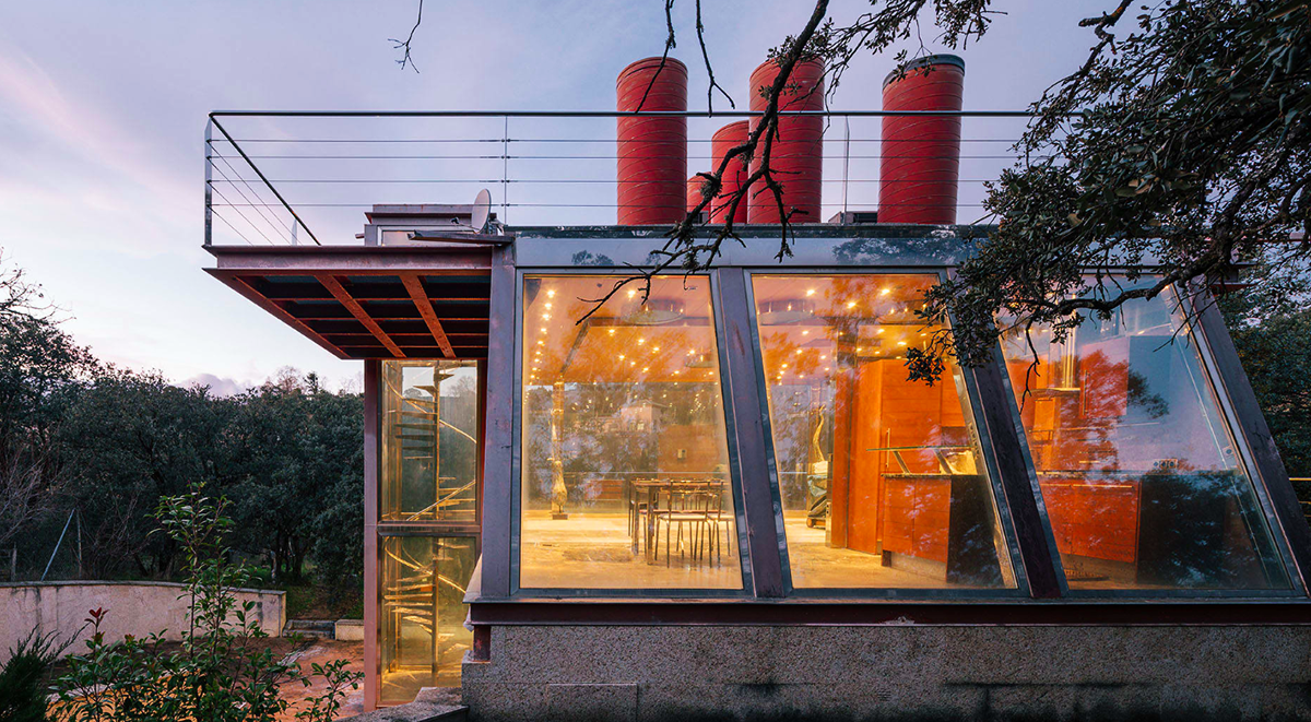 Penelas Architects completes fully-glassed facade pavilion in Spanish forest