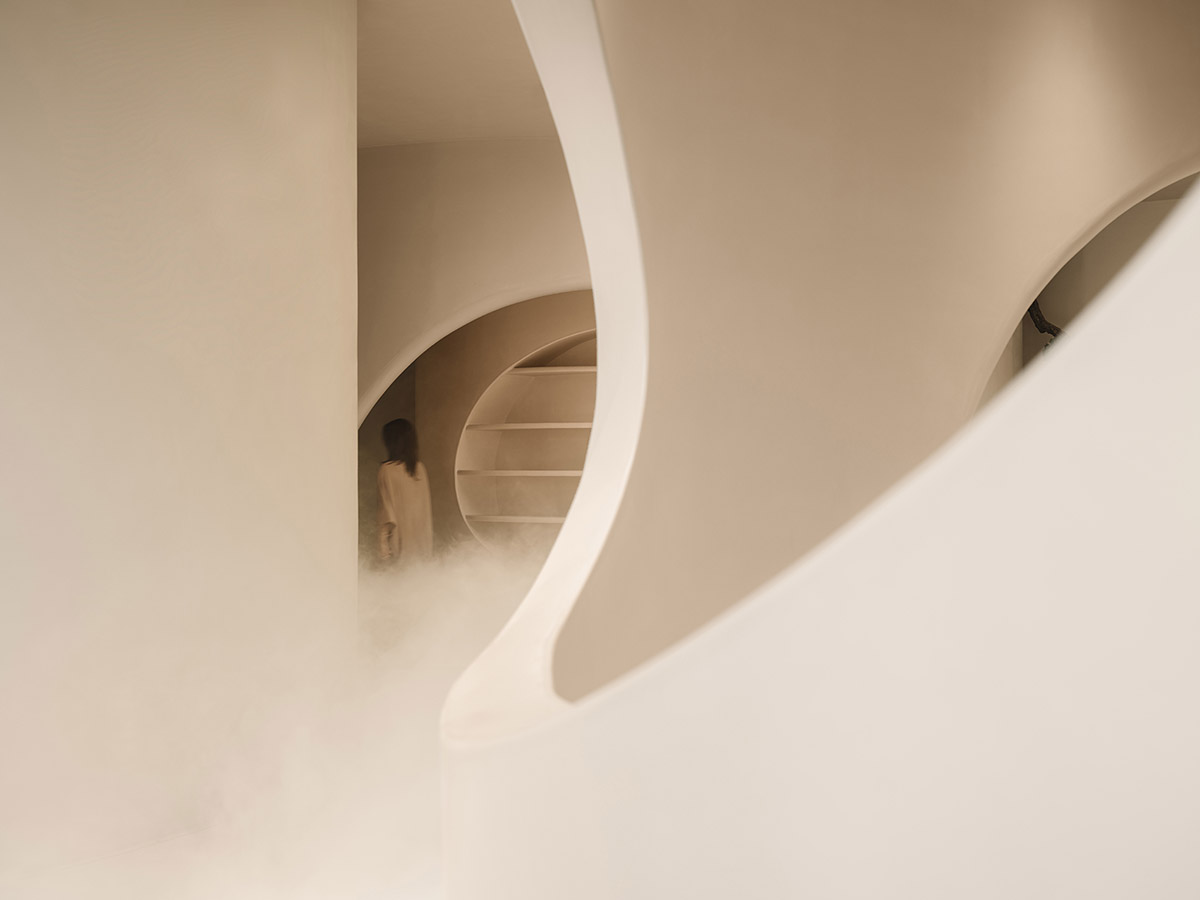 Undulating and smooth walls form this retail store by Panda NANA in Jinan, China