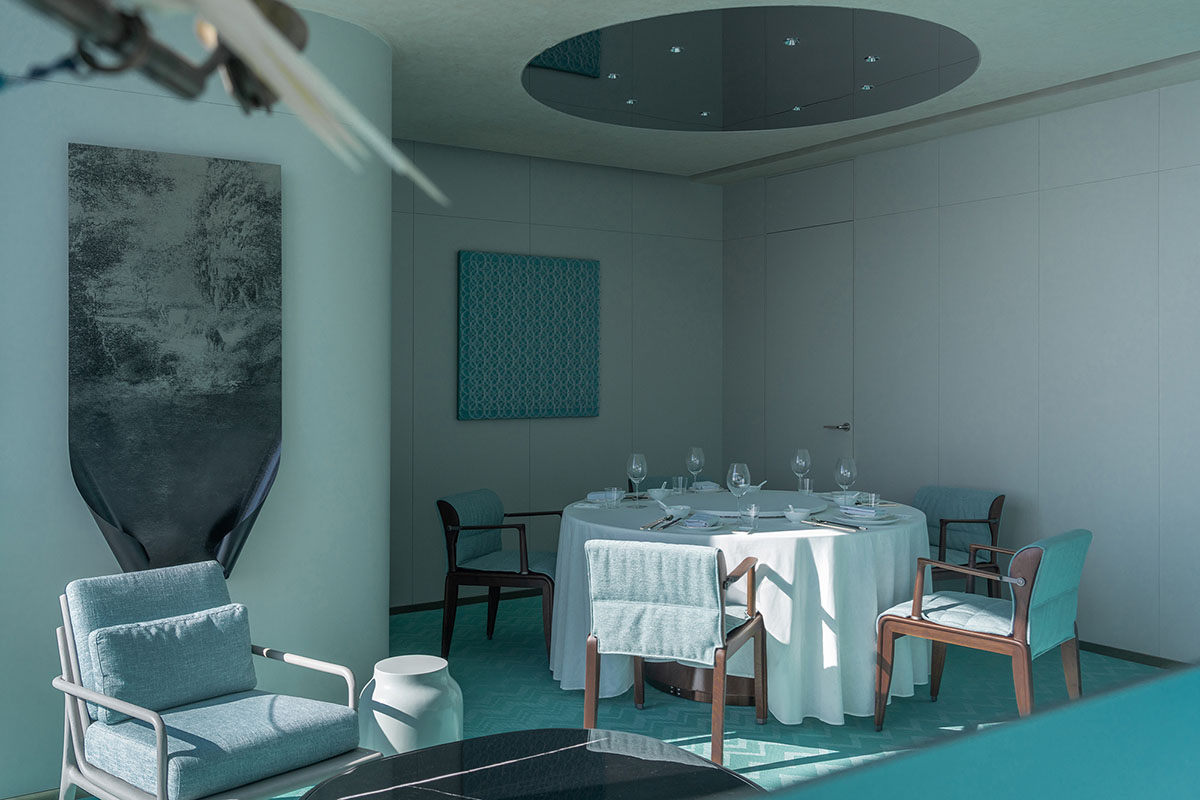 Nature Times Art Design completes restaurant with cave-like wall and garden-themed hall in Hangzhou