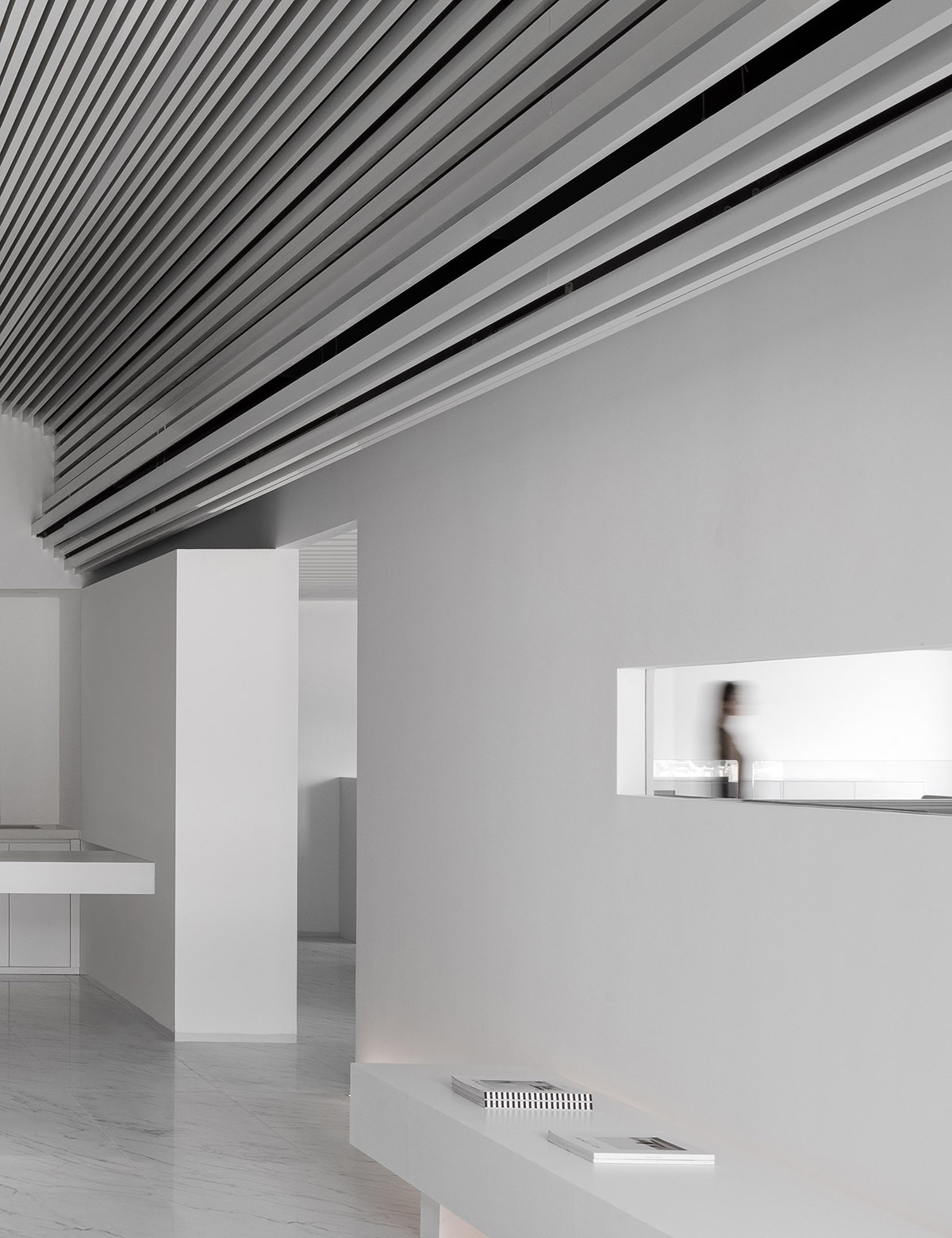 Runxuan Textile Office features white-toned interiors reinterpreted from production process of cloth