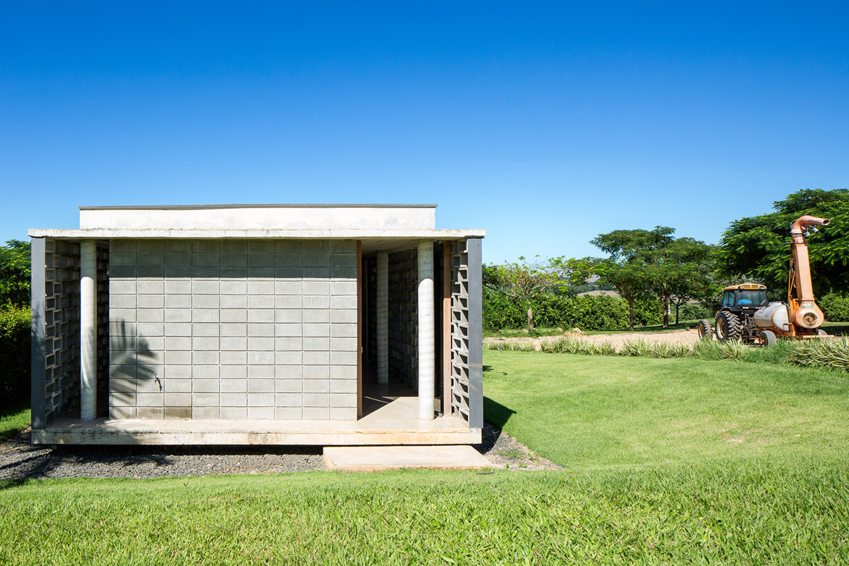 Hollowed-out concrete screens create changing filter for this service building in São Paulo