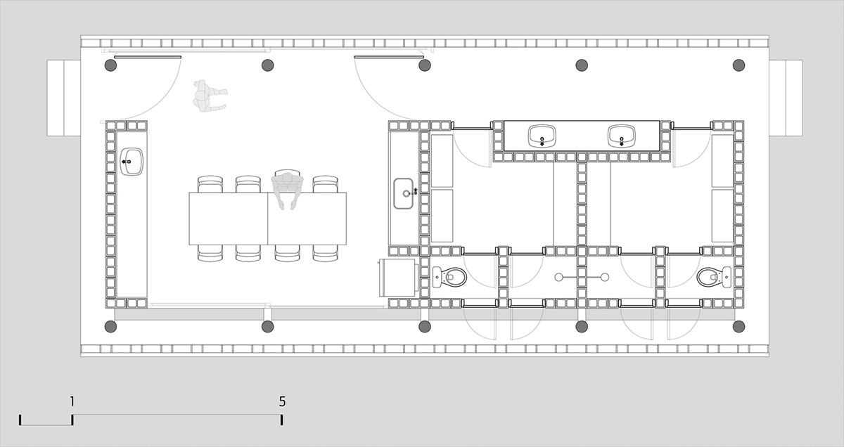 Hollowed-out concrete screens create changing filter for this service building in São Paulo