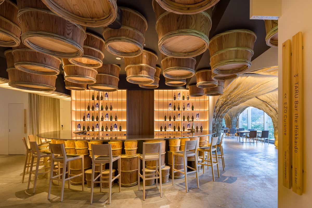 Kengo Kuma completes We Hotel Toya with cave-like interior on the shore of Lake Toya in Japan