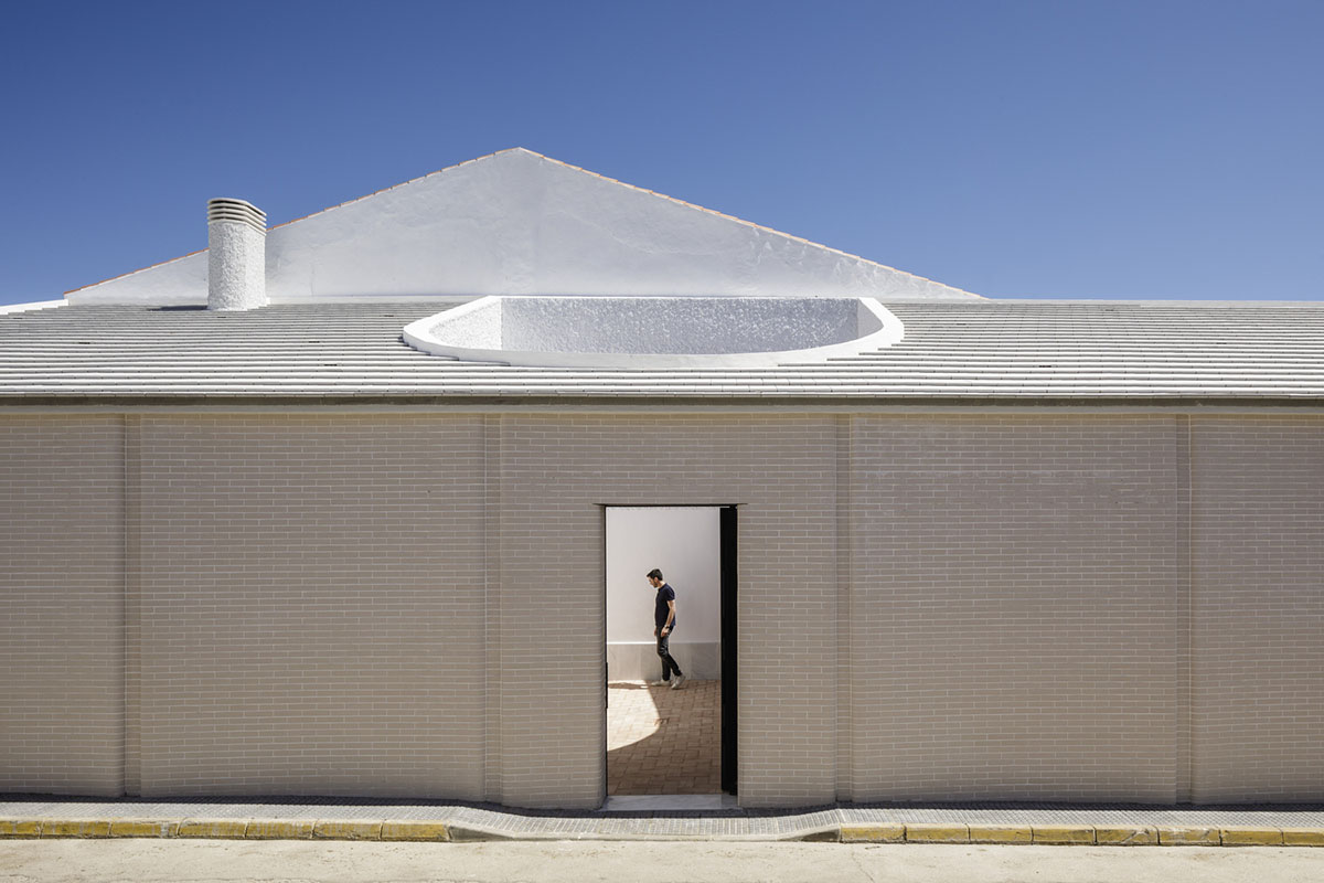 Studio Wet creates single linear space for a fortress-like family house in small village of Spain