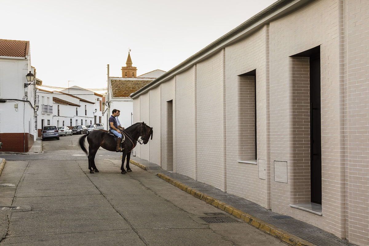 Studio Wet creates single linear space for a fortress-like family house in small village of Spain
