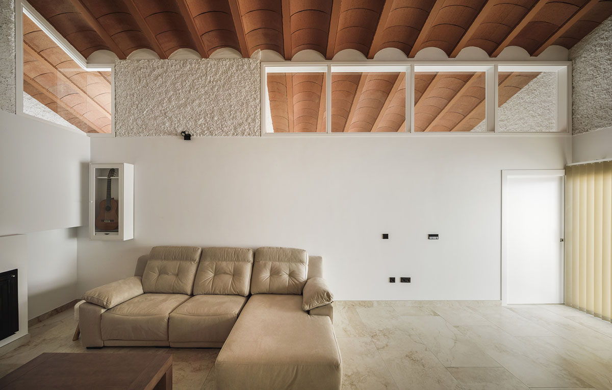 Studio Wet creates single linear space for a fortress-like family house in small village of Spain