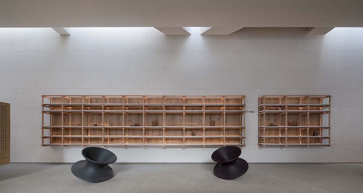 Waterfrom Design creates peaceful interior with wooden furnitures for tea community center in China