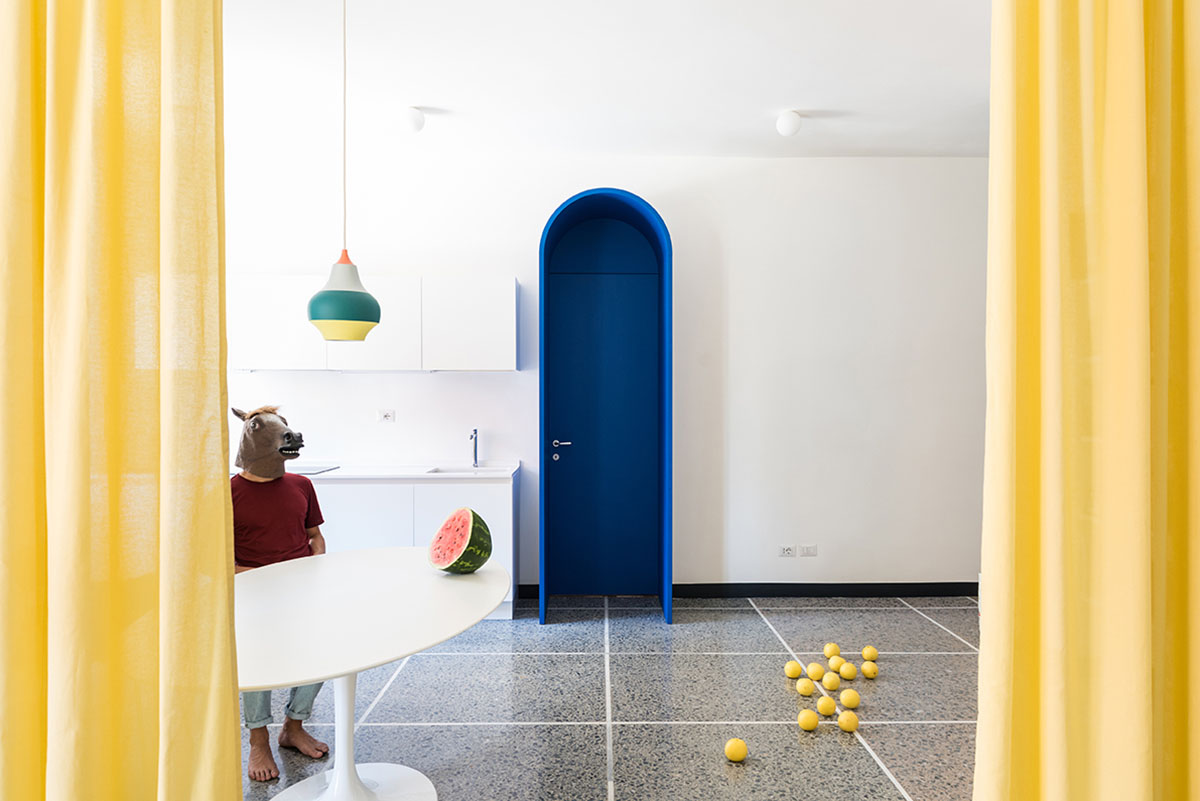 La Macchina Studio revives old apartment with theatrical and colorful interiors in Rome