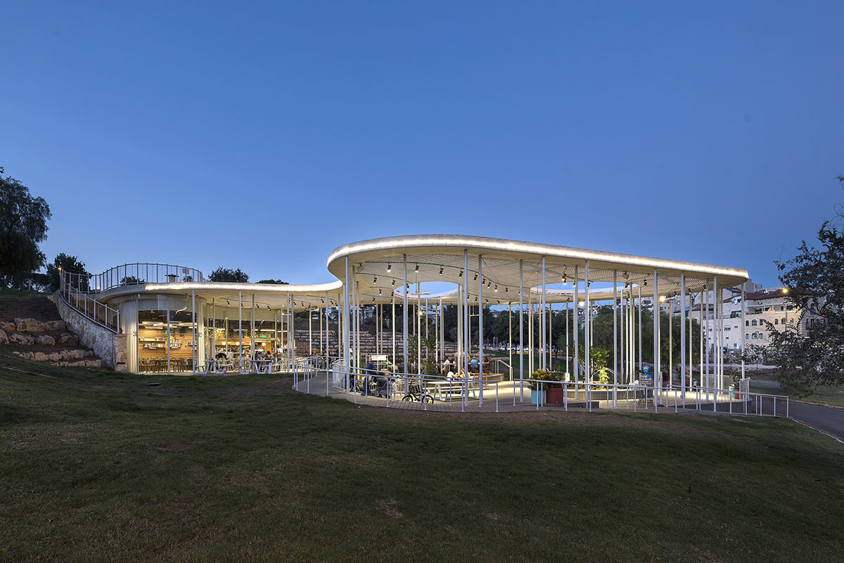 Yaniv Pardo Architects designs open coffee shop with slim columns in idyllic landscape of Jerusalem