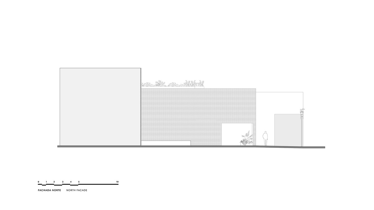 ESRAWE designs house by using red brick pavilion-like volumes in Mexico City