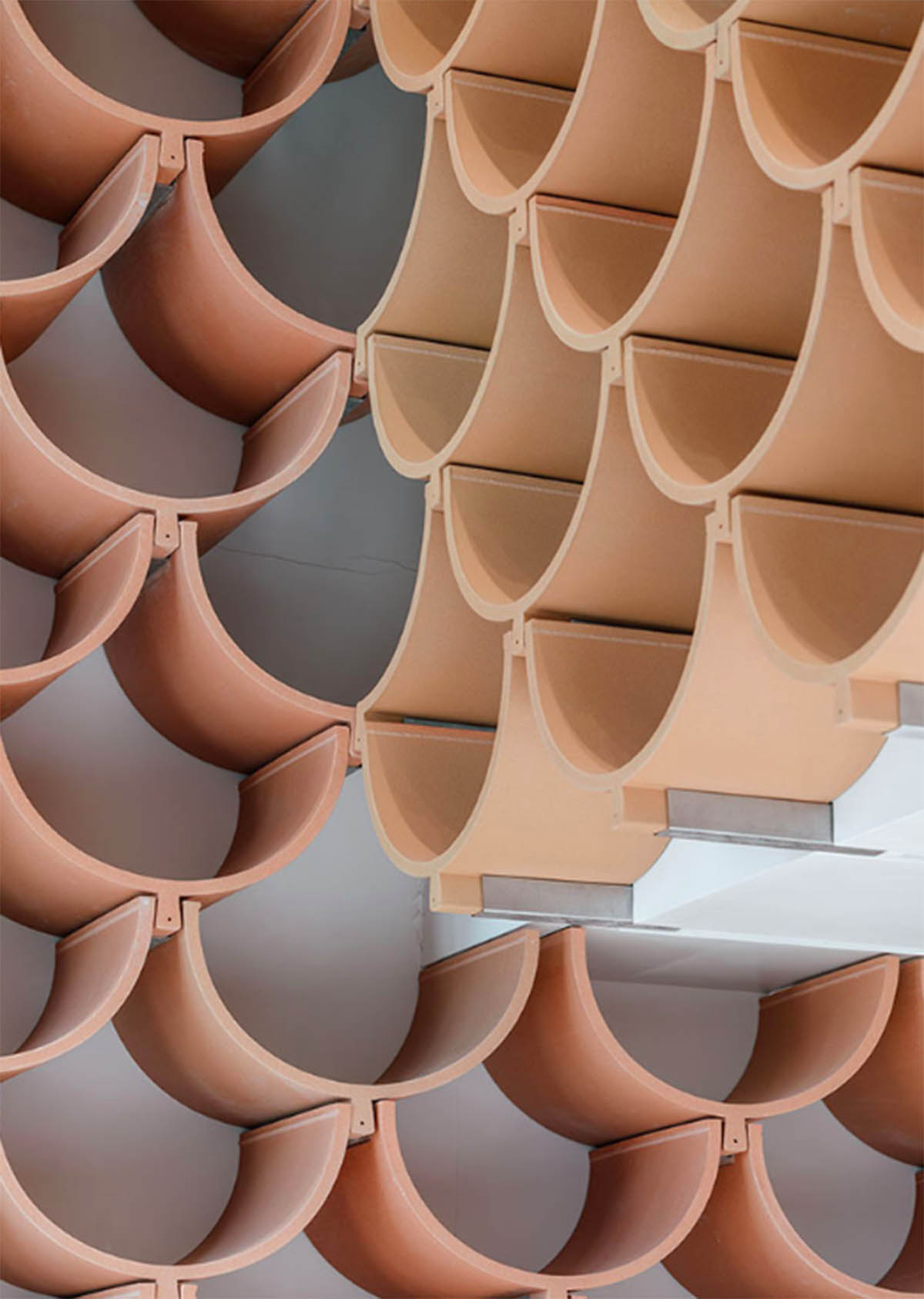 Kengo Kuma and Associates renovates Camper’s first shop in Barcelona with vault-shaped ceramic plates