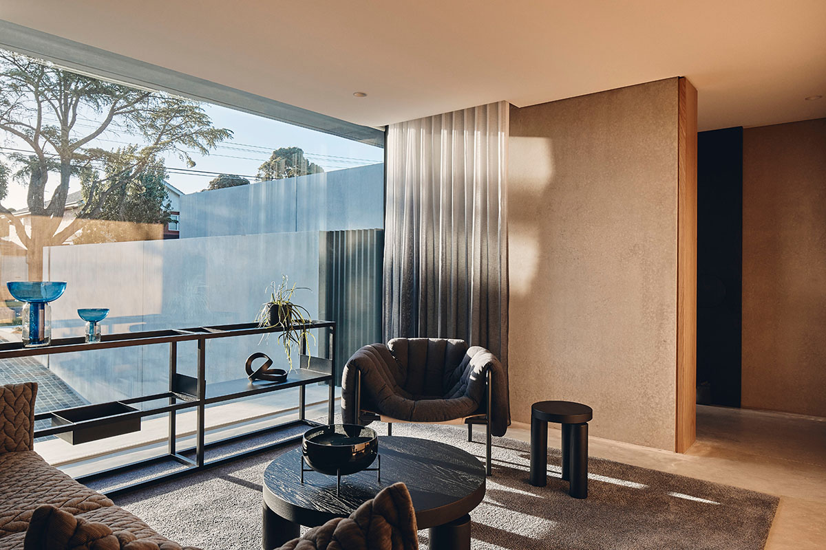 Courtyard Residence features layers of walls that heighten the sense of intrigue in Melbourne