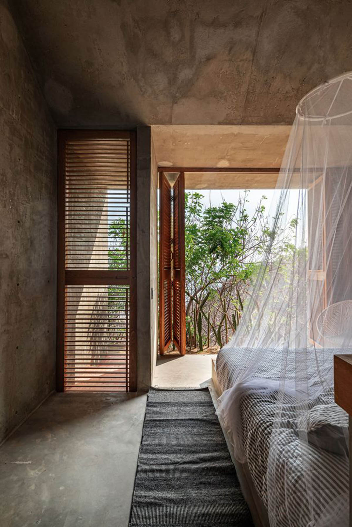 Espacio 18 Arquitectura completes Casa del Sapo with rotating concrete volumes in Mexican coast
