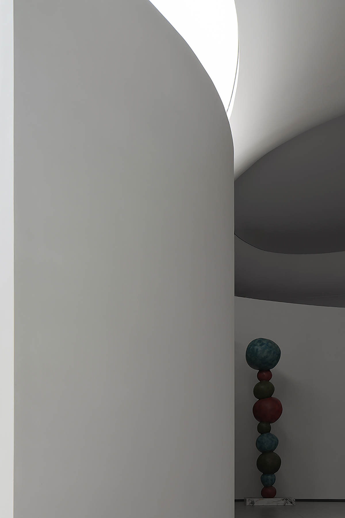 Exhibition hall interiors in China feature unconstrained flowing wall evoking