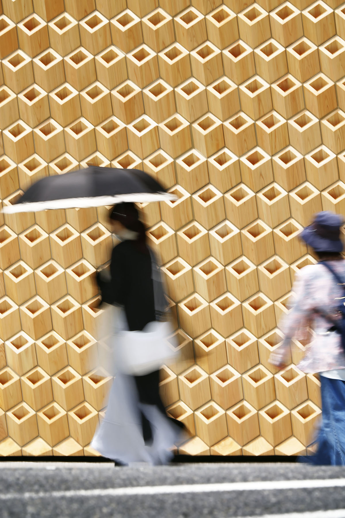 Wooden interlocking diamonds form this Cartier store designed by Klein Dytham Architecture in Osaka