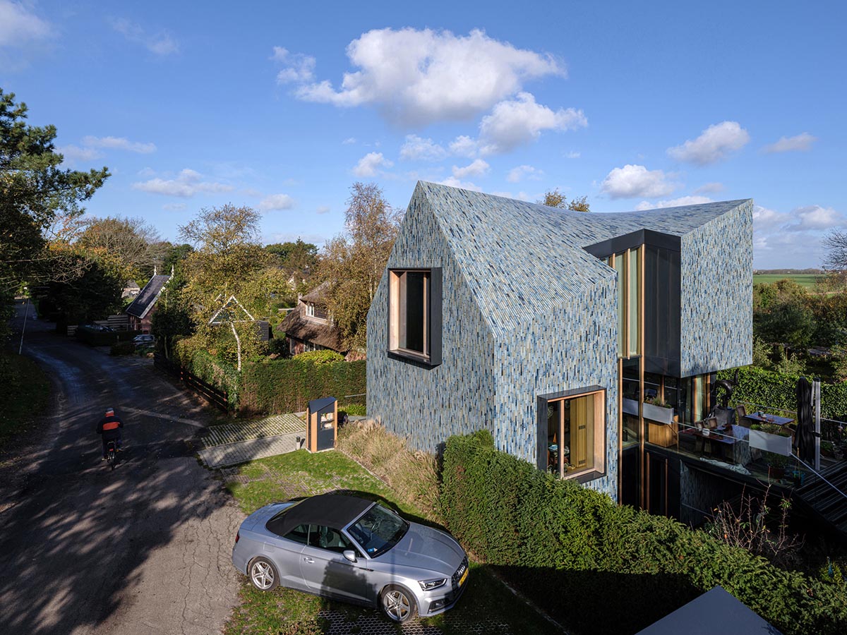 Mecanoo clads Villa BW in multicoloured glazed tiles evoking 