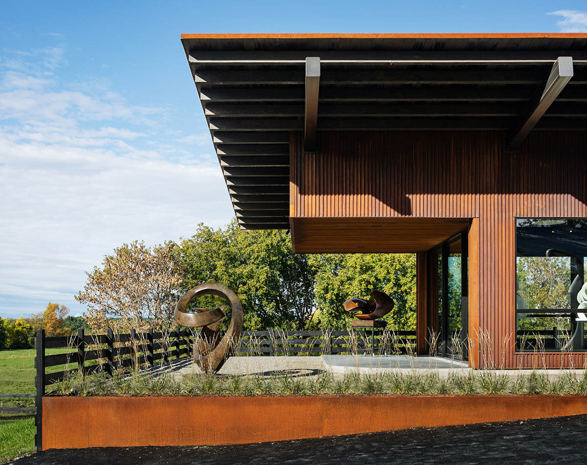 Corten steel artist's studio by Birdseye is enriched by light-filled interior on a valley of Vermont