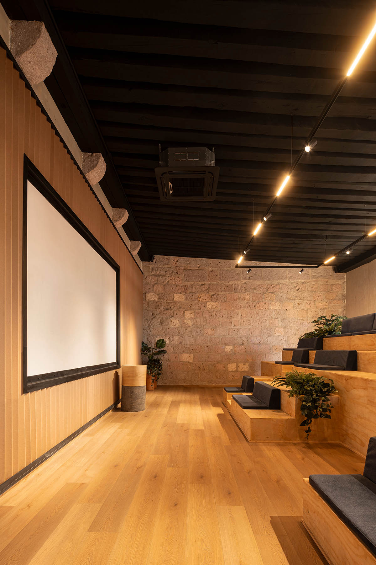 FMA. designs corporate building with warm, earthy tones in a former 17th-century convent