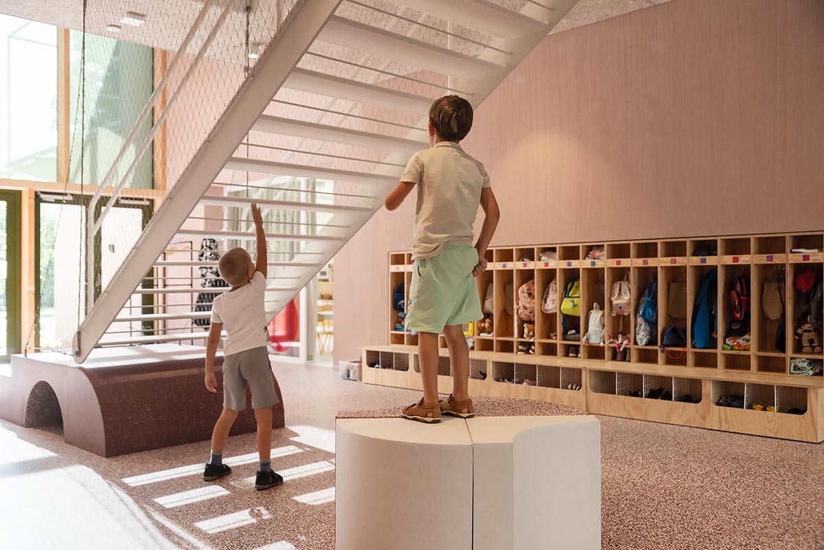 Archikon Architects reimagines Hungarian apartments into a vibrant pink kindergarten