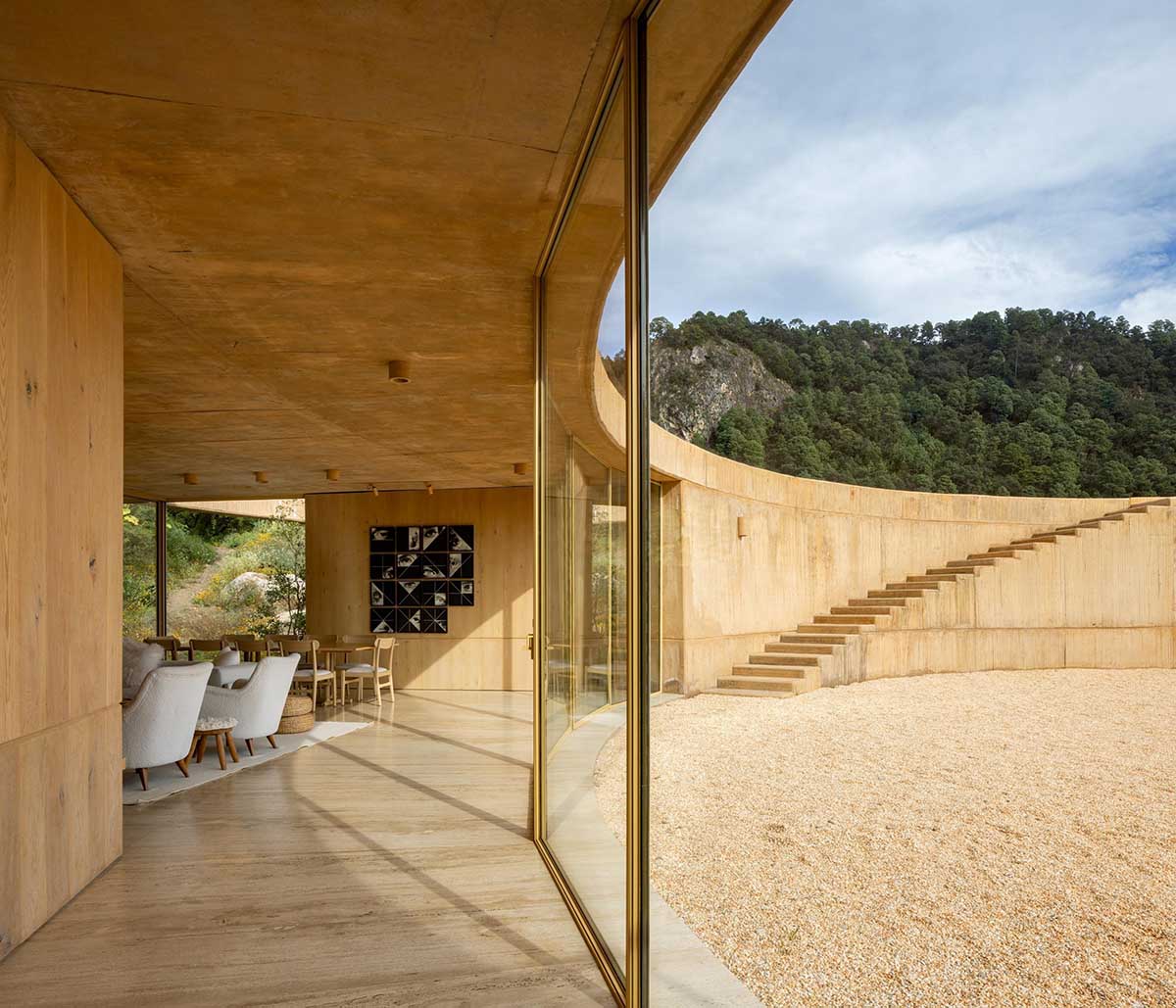 Fernanda Canales creates a circular home framing a mountain and a volcano in Mexico